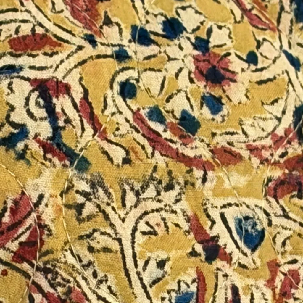 quilted jasje 1 zijde 1 detail.webp