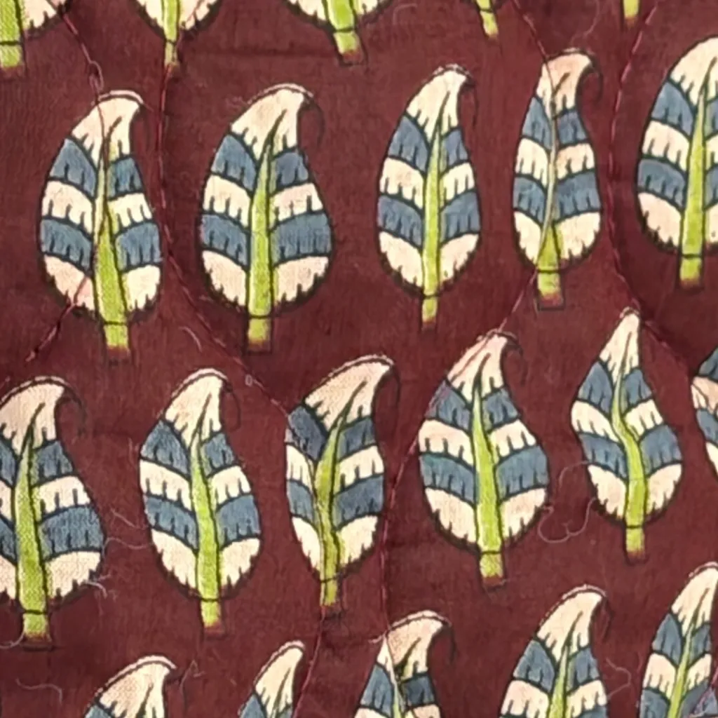 quilted jasje 3 zijde 1 detail.webp